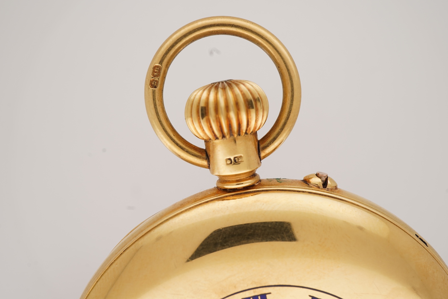 A George V 18ct gold half hunter keyless lever pocket watch, retailed by Mappin
